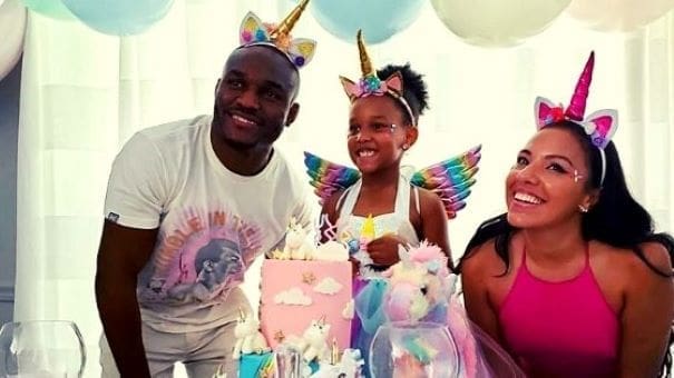 Kamaru Usman with his wife and daughter