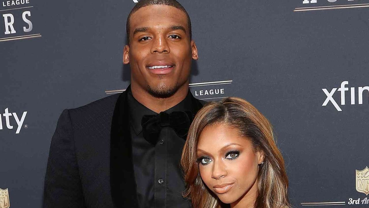 Cam Newton with his girlfriend Jasmin Brown