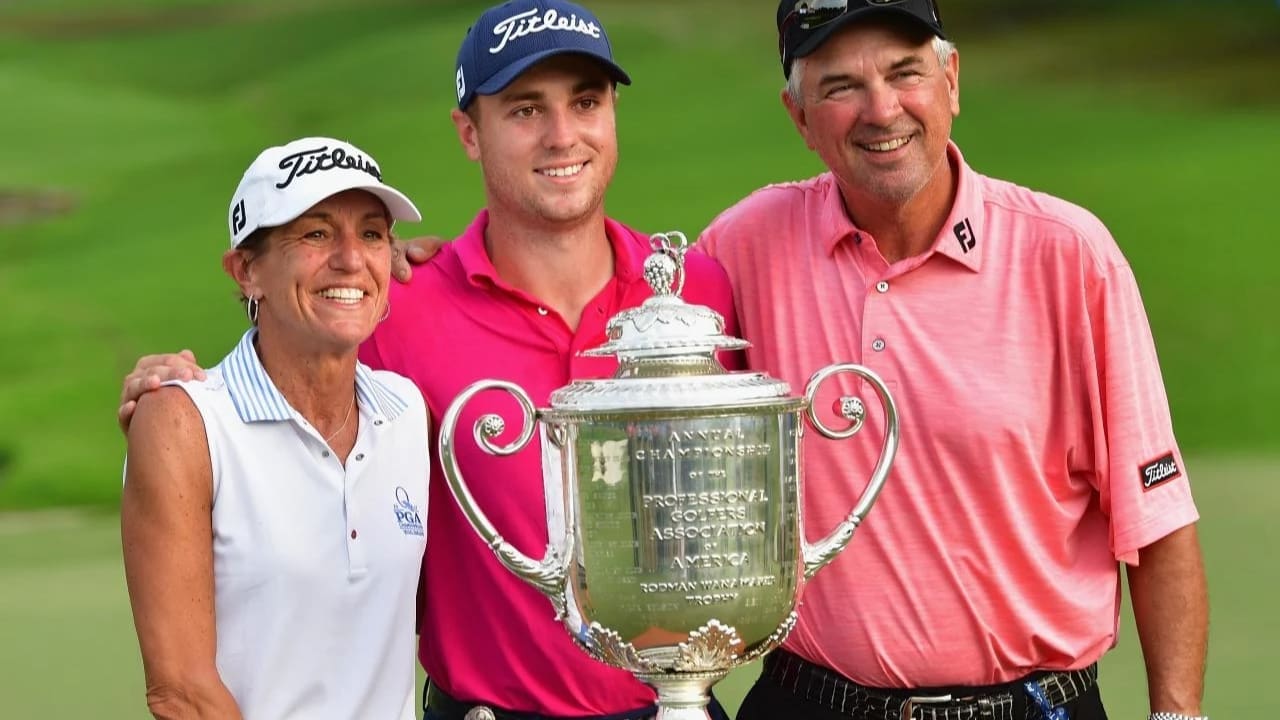 Justin Thomas with his parents