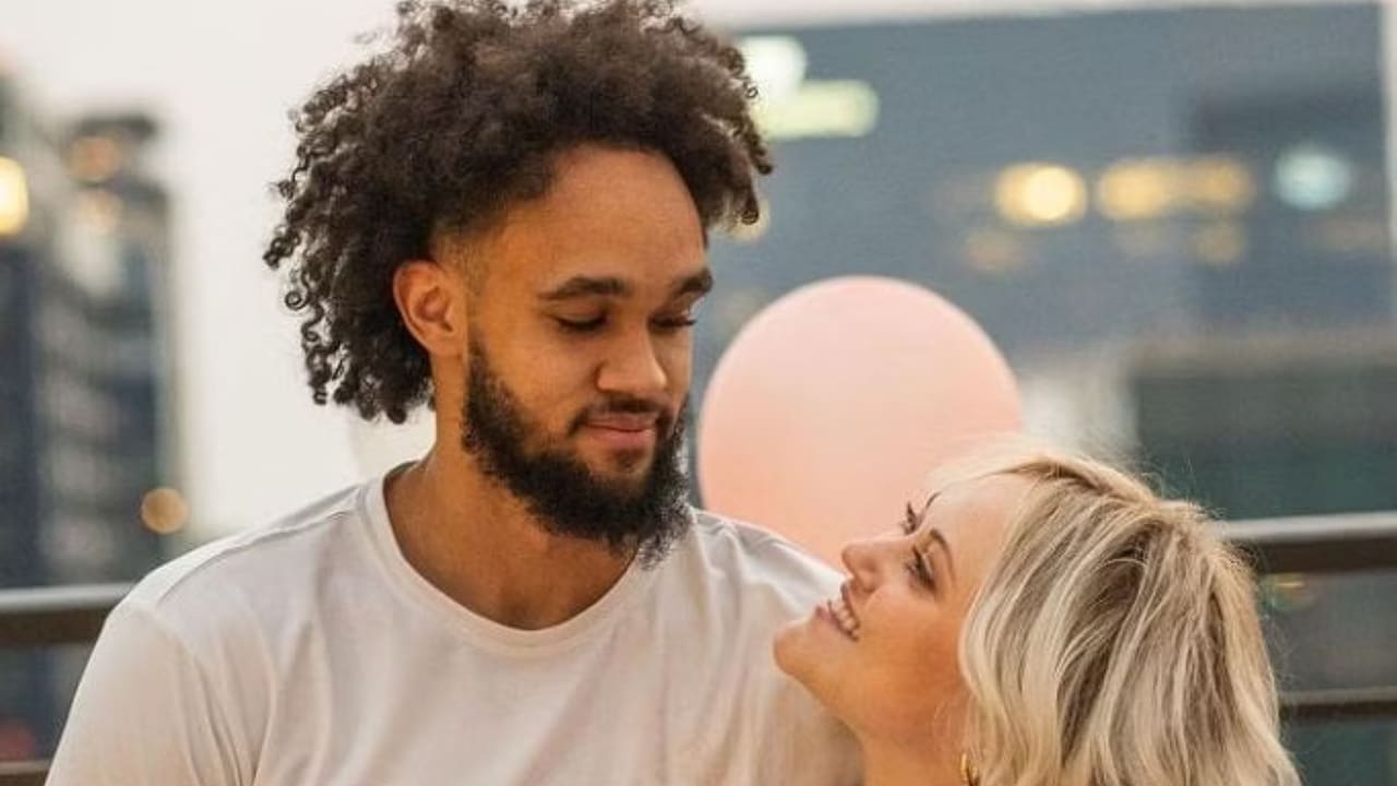 Derrick White with his wife Hannah Schneider