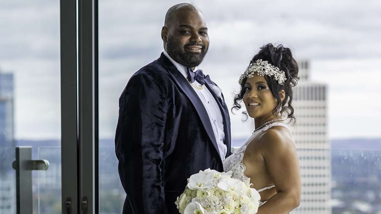 Michael Oher with his wife Tiffany Roy