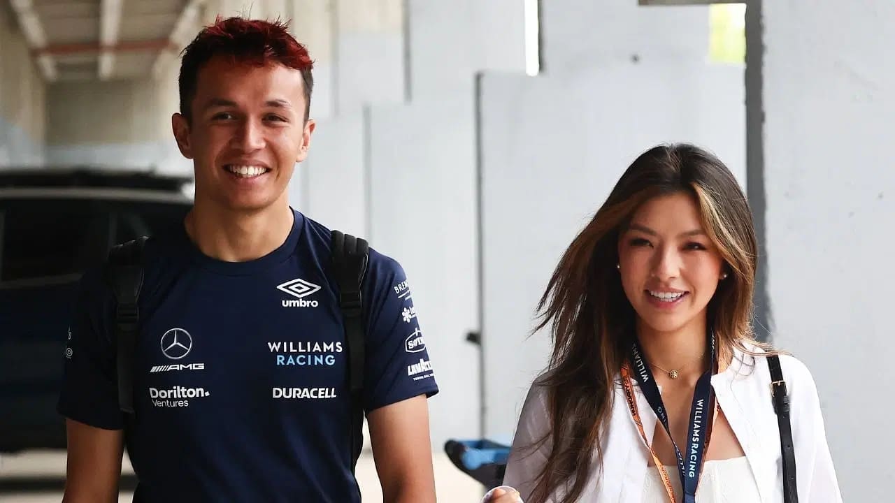 Alex Albon Net Worth in 2026: Salary, Earnings, Girlfriend Alex Albon with his girlfriend Lily Muni