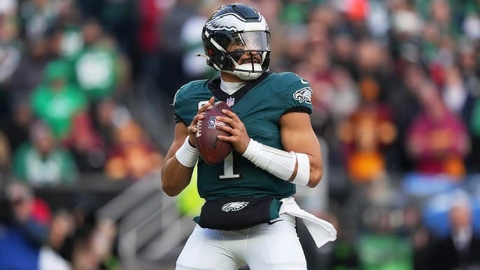 Jalen Hurts with a Football