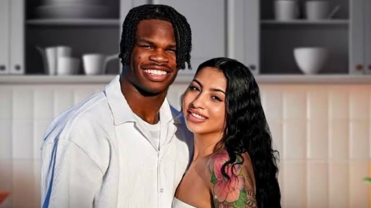 Travis Hunter his wife Leanna Lenee