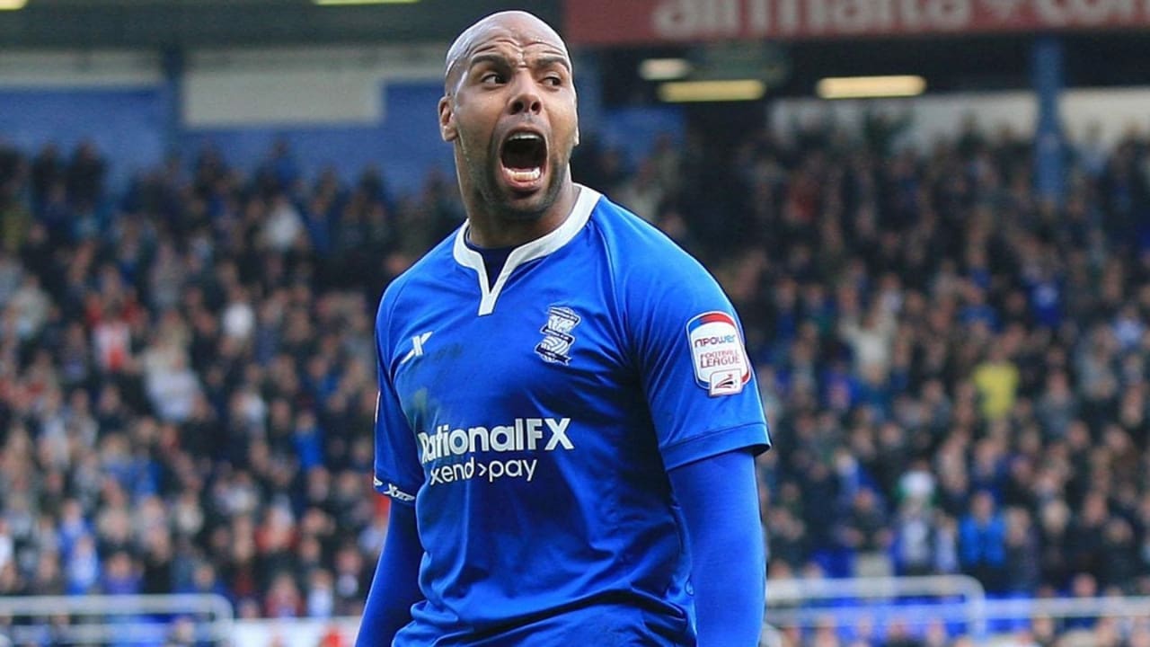 Marlon king's Net Worth Details Marlon king in blue jersey.