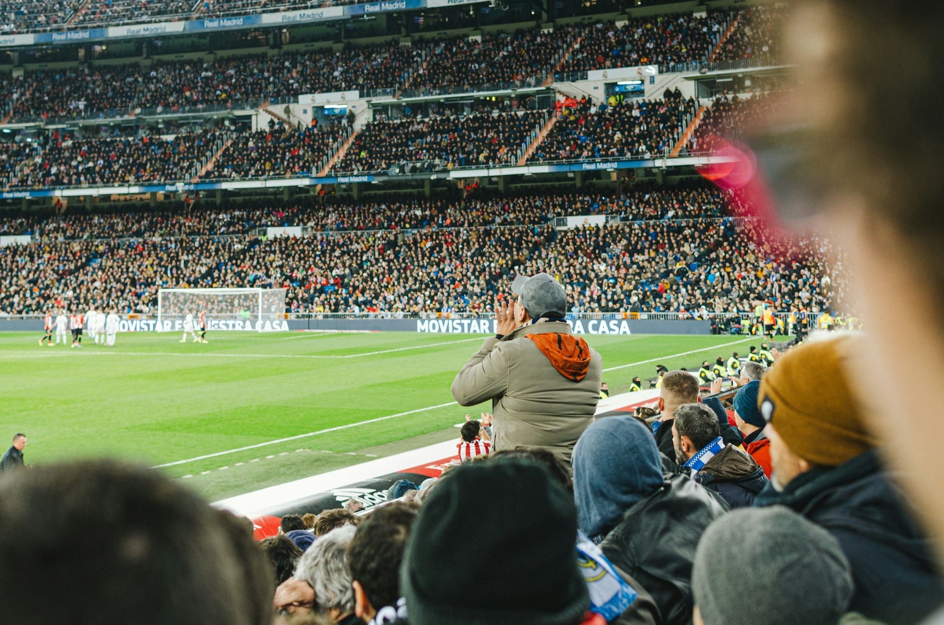 A fan cheering for their favorite football team A fan cheering for their favorite football team